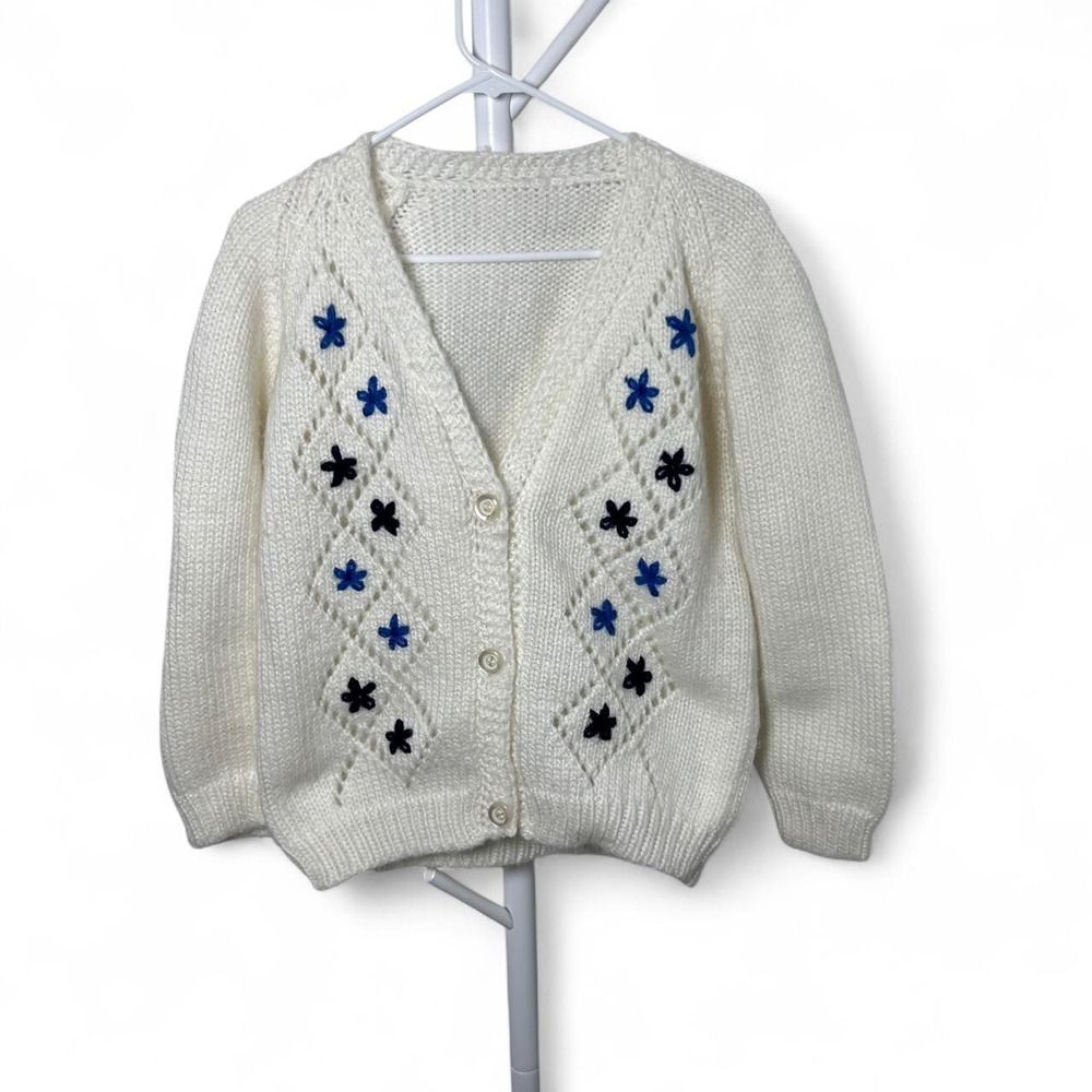 Hand Knit Cream cardigan sweater with blue and black floral flowers